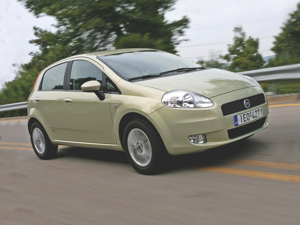 Fiat Grande Punto с пробегом: двери с бахромой и капризы электроусилителя - «Fiat»