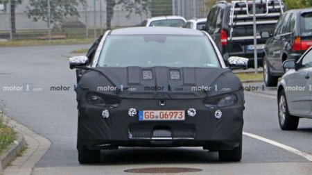 Новый электрический кроссовер от Kia снова засняли во время тестов в камуфляже - «Новостной Автоблогер»